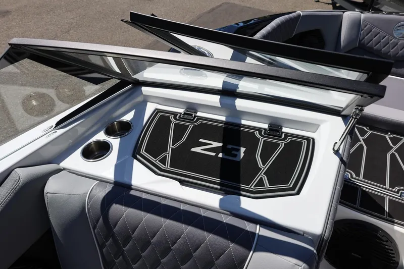 Slide: The Image of 2026 Tigé Z3 boat interior with cup holders and stylish upholstery. - 60
