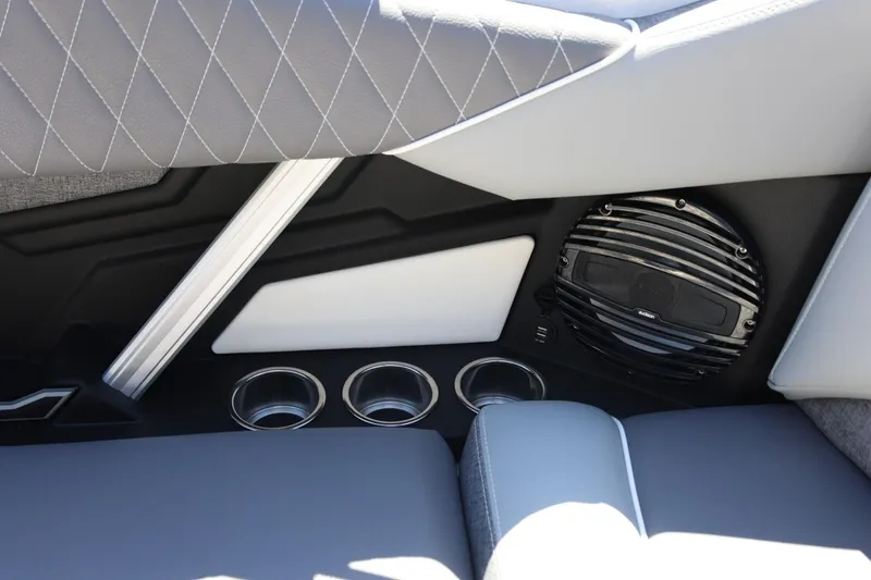 Slide: The Image of 2026 Tigé Z3 interior with speaker, cup holders, and quilted upholstery. - 62
