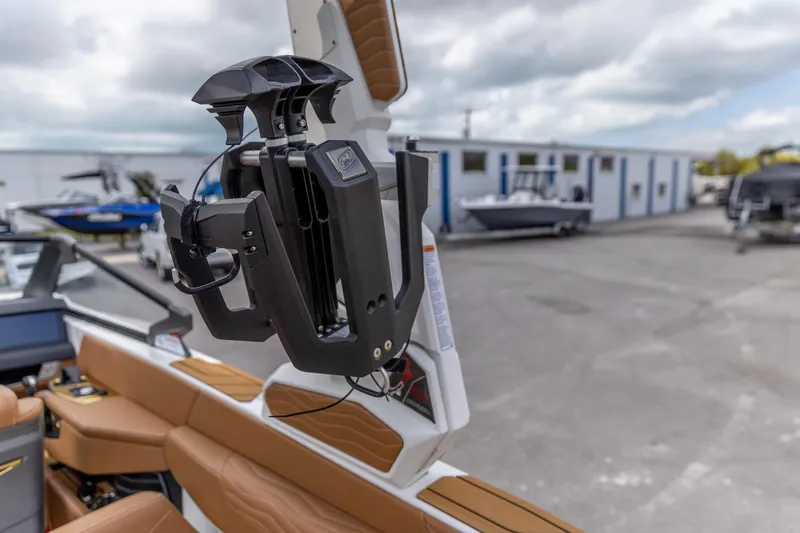 Slide: The Image of 2025 Nautique Super Air Nautique G23 interior with advanced wakeboard rack. - 12