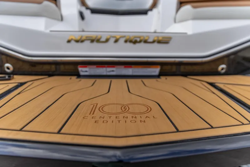 Slide: The Image of 2025 Nautique Super Air Nautique G23 Centennial Edition boat deck detail. - 21