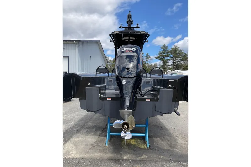 Slide: The Image of 2016 Ocean Marine Craft Amphibious vehicle with propeller, parked outdoors under blue sky. - 4