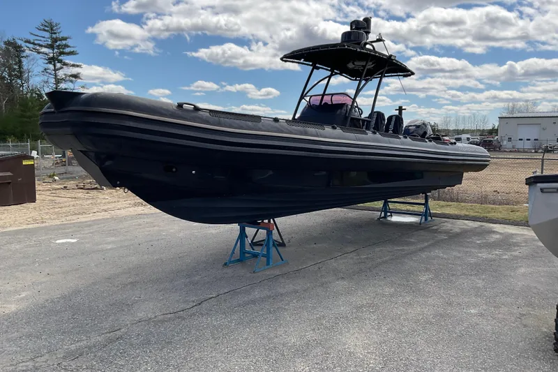 Slide: The Image of 2016 Ocean Marine Craft Amphibious boat on stands under a cloudy sky. - 5