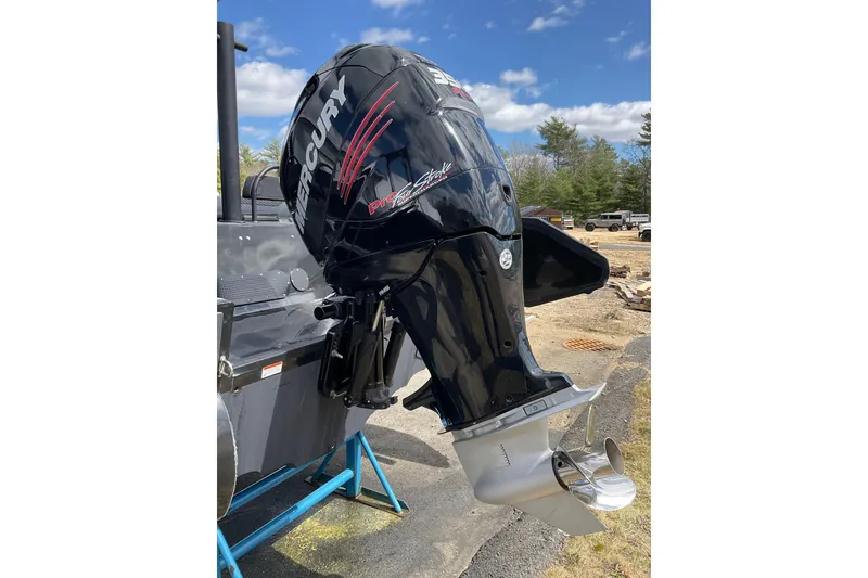 Slide: The Image of 2016 Ocean Marine Craft Amphibious boat with Mercury outboard motor, parked outdoors. - 7