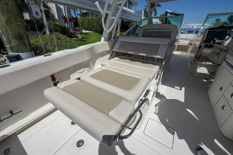Slide: The Image of 2017 Boston Whaler 320 Vantage boat interior with adjustable seating and modern design. - 15