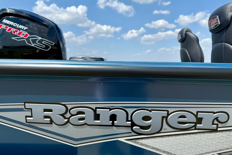 Slide: The Image of 2026 Ranger VS1682SC Angler boat with Mercury Pro XS engine under a blue sky. - 12