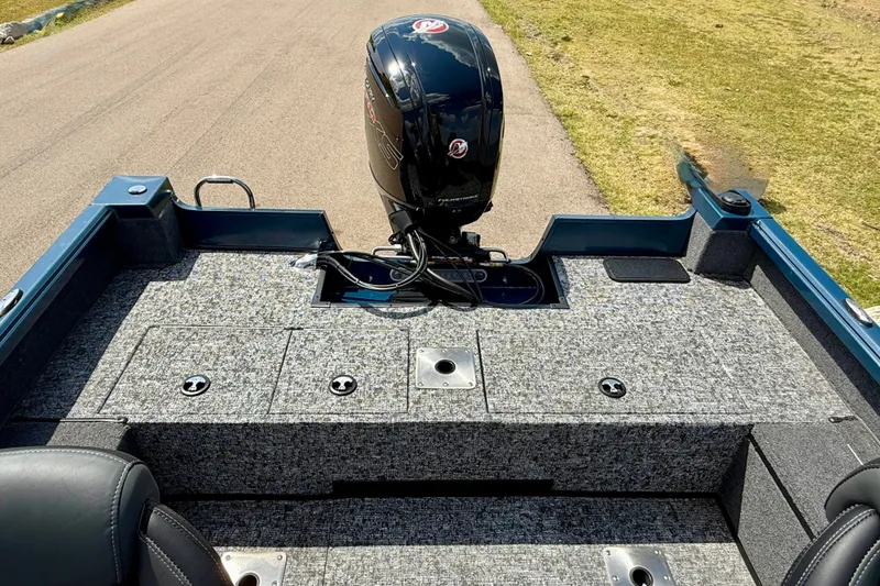 Slide: The Image of 2026 Ranger VS1682SC Angler boat with motor, featuring spacious deck and seating. - 10