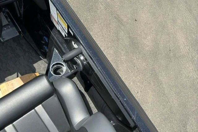 Slide: The Image of Interior view of a 2026 Nitro Z21 XL Pro boat, featuring seating and control panel. - 19