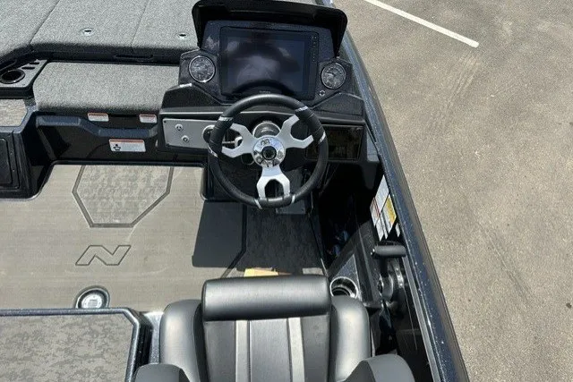 Slide: The Image of 2026 Nitro Z21 XL Pro boat cockpit with steering wheel and dashboard display. - 20