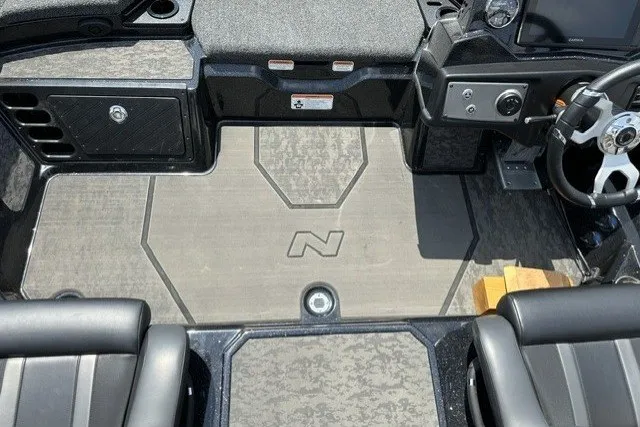Slide: The Image of 2026 Nitro Z21 XL Pro boat interior with sleek dashboard and seating. - 22