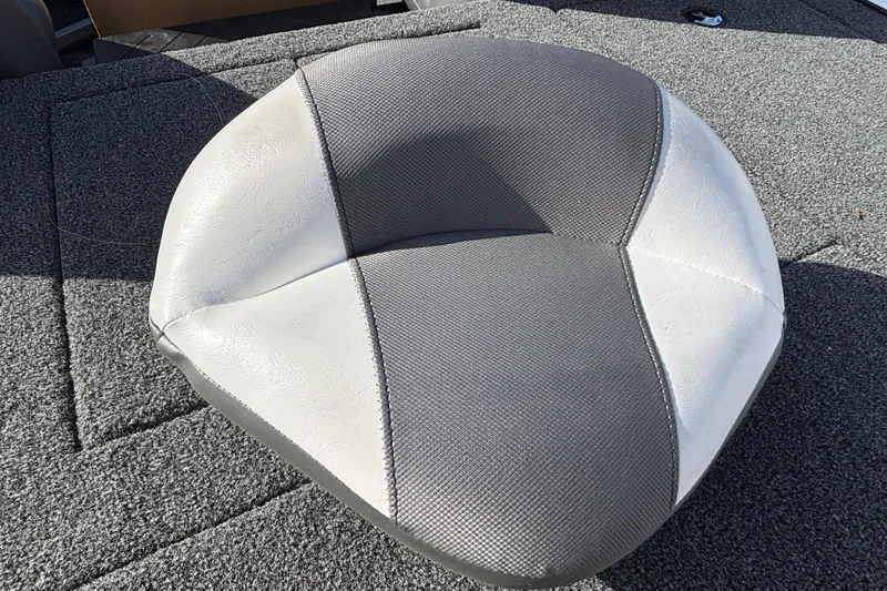 Slide: The Image of Gray and white seat on a 2026 Nitro Z17 boat deck. - 102