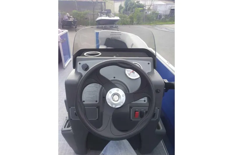 Slide: The Image of Steering console of 2026 Sun Tracker Party Barge 16 DLX pontoon boat. - 12