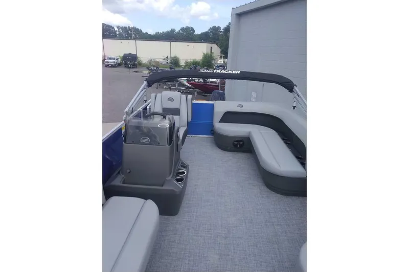 Slide: The Image of 2026 Sun Tracker Party Barge 16 DLX pontoon boat with spacious seating and canopy. - 8