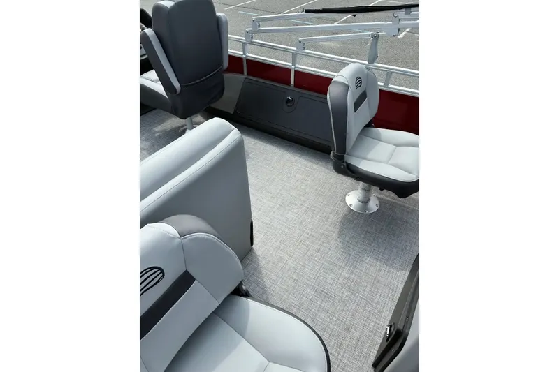 Slide: The Image of 2026 Sun Tracker SportFish 22 XP3 interior with gray seating and modern design. - 18