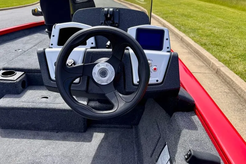 Slide: The Image of Steering console of 2026 Tracker Pro Team 175 boat with modern controls. - 9