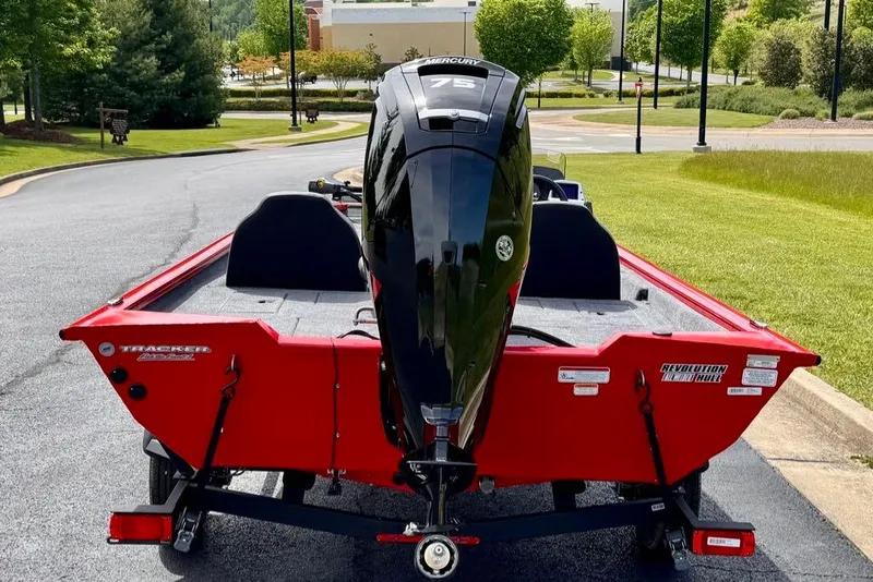 Slide: The Image of 2026 Tracker Pro Team 175 boat with Mercury 75 engine, parked on a sunny day. - 5