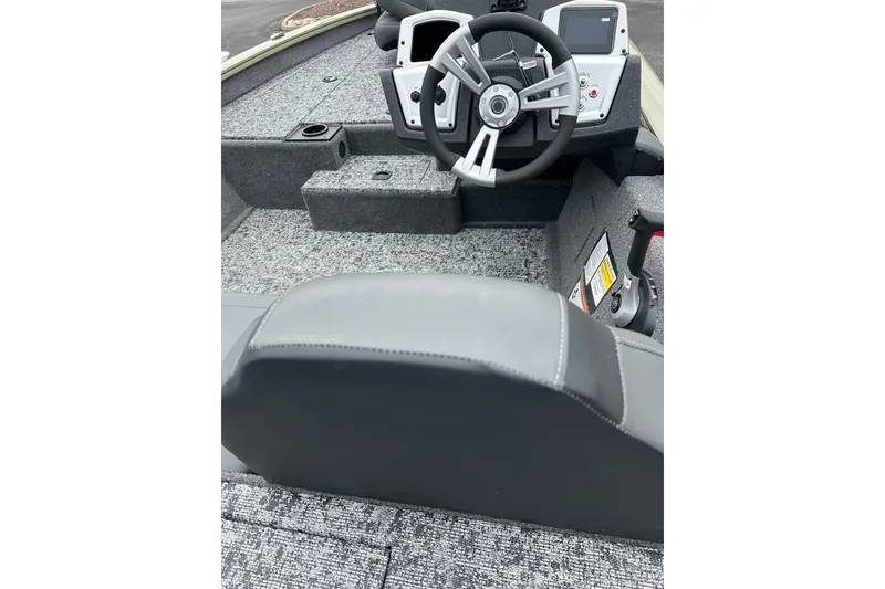 Slide: The Image of 2026 Tracker Pro Team 190 boat interior with steering wheel and dashboard controls. - 3
