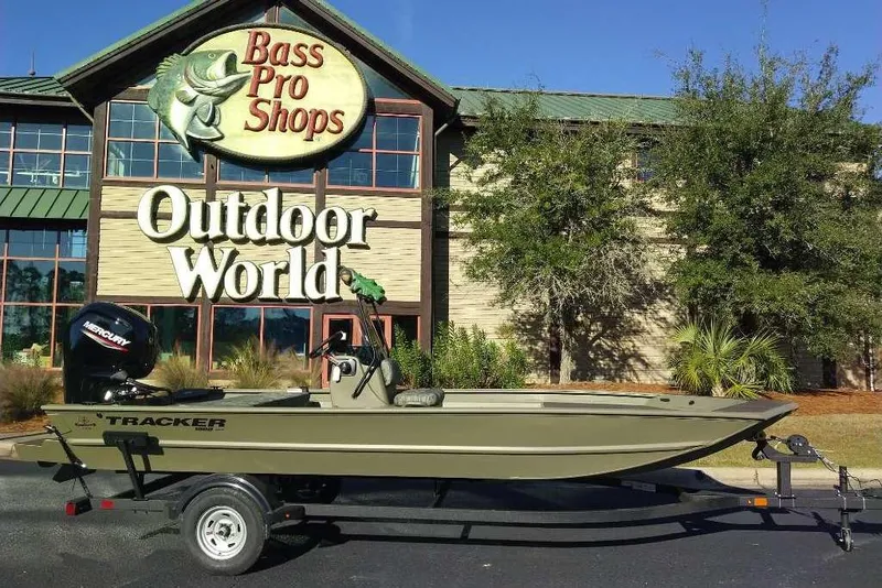 The Image of 2026 Tracker Grizzly 1860 CC boat at Bass Pro Shops Outdoor World entrance. - 0
