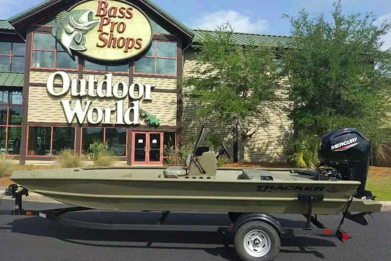 Slide: The Image of 2026 Tracker Grizzly 1860 CC boat outside Bass Pro Shops Outdoor World. - 8