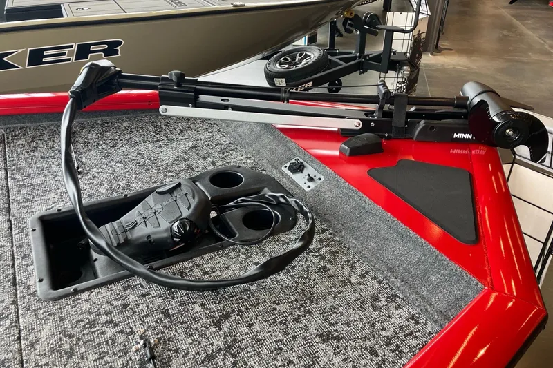Slide: The Image of 2026 Tracker Pro Team 195 boat deck with trolling motor and carpeted surface. - 5