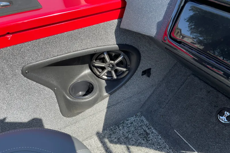 Slide: The Image of Interior of 2026 Tracker Targa V-18 Combo boat with speaker and cup holder. - 34