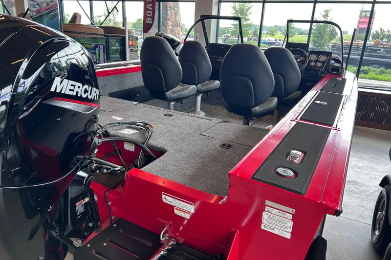 Slide: The Image of 2026 Tracker Targa V-18 Combo boat interior with Mercury engine, featuring spacious seating and modern design. - 12