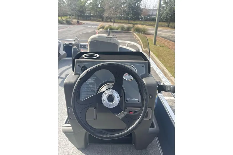 Slide: The Image of Steering console of 2026 Sun Tracker Bass Buggy 16 XL Select pontoon boat. - 12