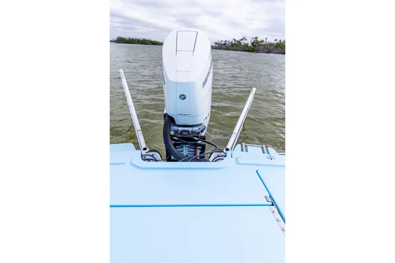 Slide: The Image of 2026 Crevalle 26 HCO boat with Mercury Verado engine on water. - 8