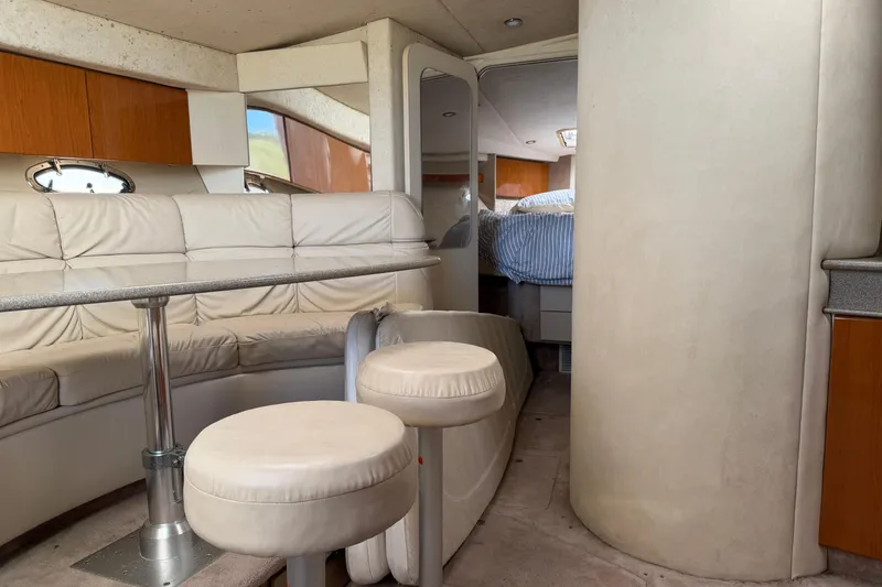 Slide: The Image of Interior of 2000 Formula 41 Performance Cruiser with plush seating and modern design. - 12