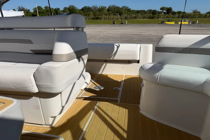 Slide: The Image of Interior of 2000 Formula 41 Performance Cruiser with white seating and wooden flooring. - 13