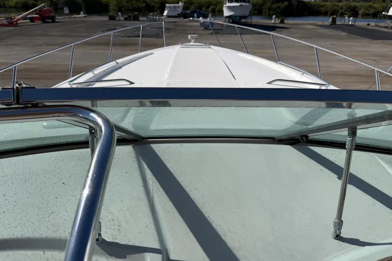 Slide: The Image of Front view of a 2000 Formula 41 Performance Cruiser on a dry dock. - 18