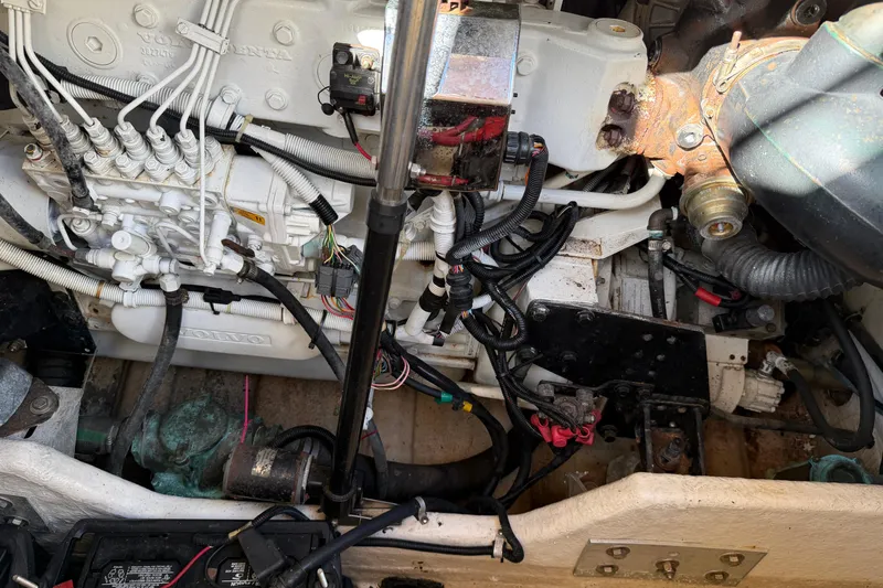 Slide: The Image of Engine compartment of a 2000 Formula 41 Performance Cruiser with visible wiring and components. - 20