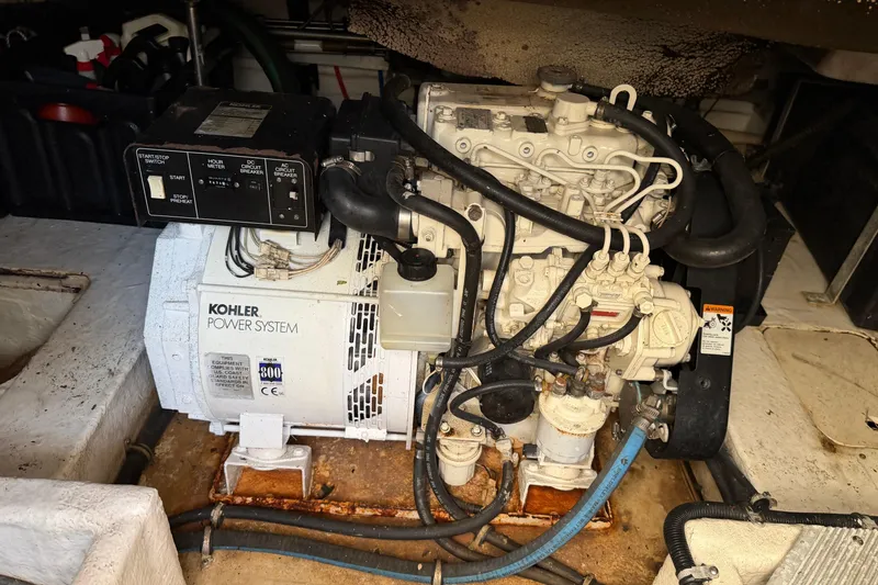 Slide: The Image of Kohler power system in a 2000 Formula 41 Performance Cruiser engine compartment. - 22