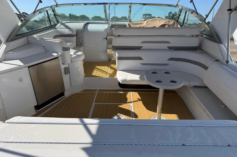 Slide: The Image of Spacious interior of 2000 Formula 41 Performance Cruiser with seating and table. - 5