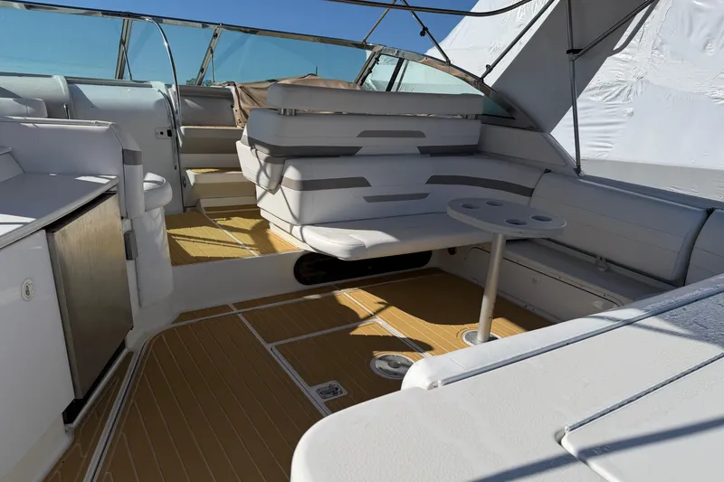 Slide: The Image of Interior of 2000 Formula 41 Performance Cruiser with seating and table. - 6