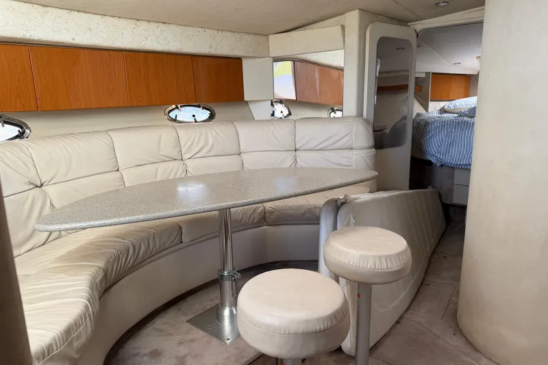 Slide: The Image of Interior of 2000 Formula 41 Performance Cruiser with plush seating and modern design. - 8