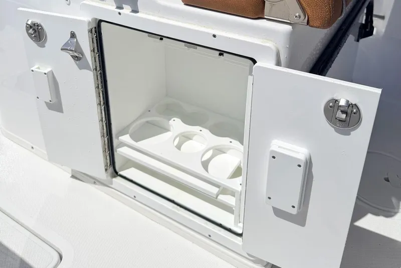 Slide: The Image of Open storage compartment in Sea Hunt Ultra 305 Coffin Box boat, 2026 model. - 14