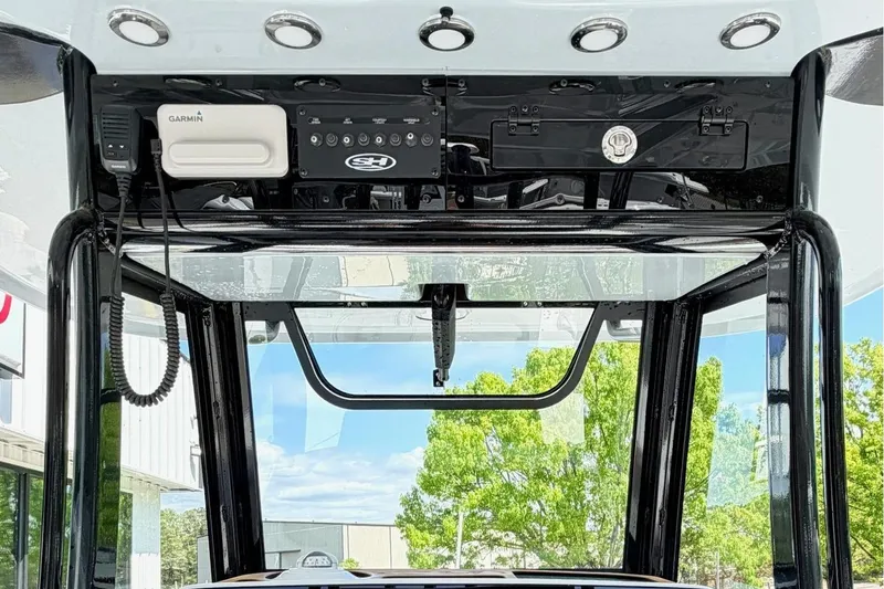 Slide: The Image of Interior view of 2026 Sea Hunt Ultra 305 Coffin Box with electronics. - 15