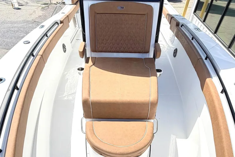 Slide: The Image of Sea Hunt Ultra 305 Coffin Box 2026 with brown upholstery. - 21
