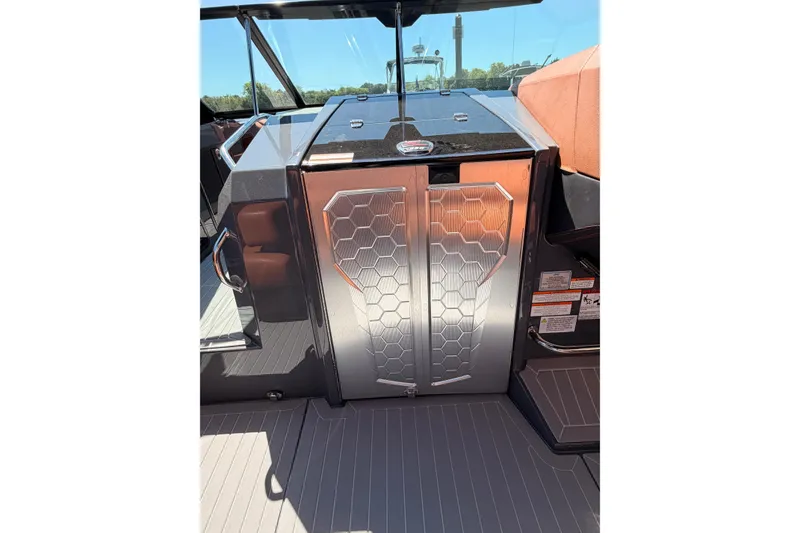 Slide: The Image of 2021 Cruisers Yachts 338 Bow Rider interior with sleek design and hexagonal pattern. - 19