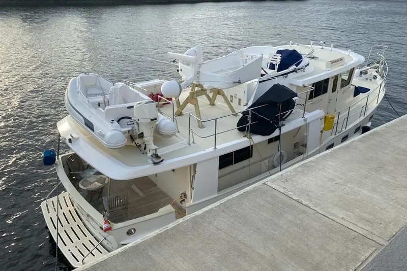 Slide: The Image of Kadey-Krogen 48 AE 2011 yacht docked, featuring spacious deck and modern amenities. - 26