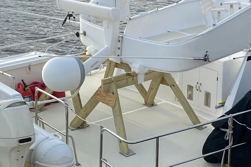 Slide: The Image of Deck of 2011 Kadey-Krogen 48 AE yacht with mounted equipment and storage compartments. - 27