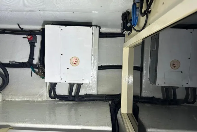 Slide: The Image of Electrical system in a 2011 Kadey-Krogen 48 AE yacht engine room. - 34