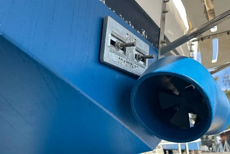 Slide: The Image of Close-up of a 2011 Kadey-Krogen 48 AE boat's blue hull and propeller. - 42