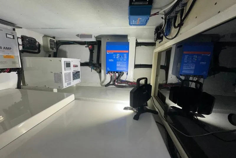 Slide: The Image of Engine room of 2011 Kadey-Krogen 48 AE with electrical equipment and wiring. - 45