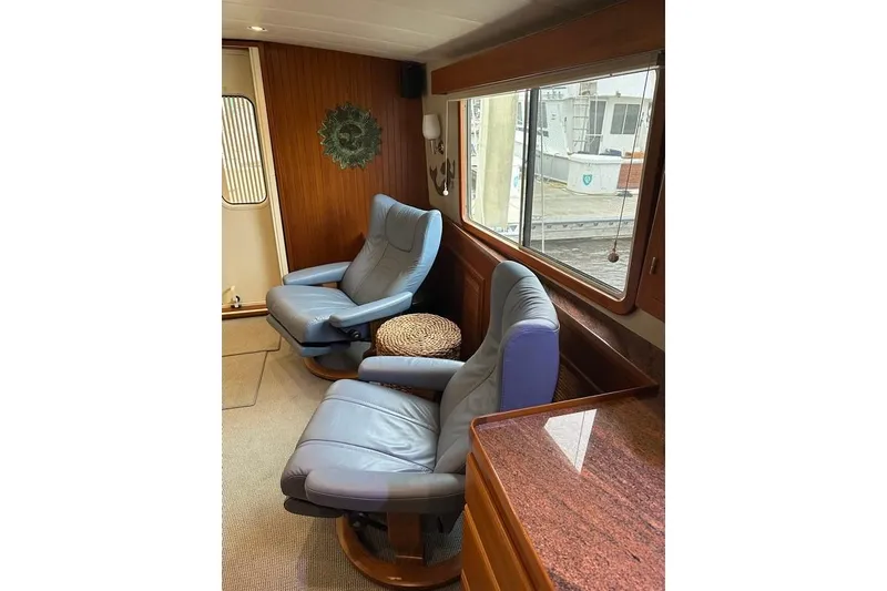 Slide: The Image of Luxurious interior of 2011 Kadey-Krogen 48 AE yacht with plush seating. - 48