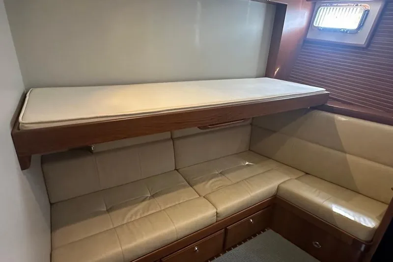 Slide: The Image of Interior of 2011 Kadey-Krogen 48 AE yacht with bunk bed and seating area. - 63