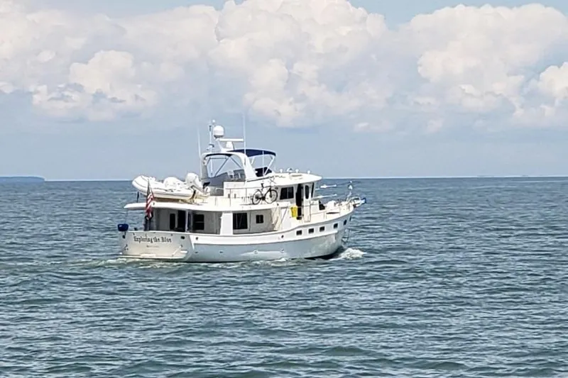 Slide: The Image of Kadey-Krogen 48 AE yacht cruising on open sea under cloudy sky, 2011 model. - 7