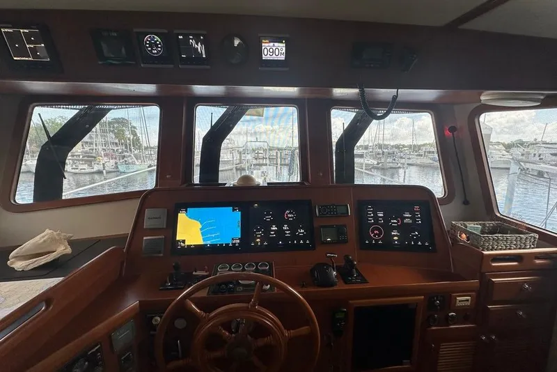 Slide: The Image of Pilothouse interior of 2011 Kadey-Krogen 48 AE yacht with navigation equipment. - 75