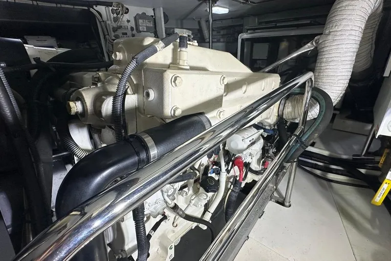 Slide: The Image of Engine room of a 2011 Kadey-Krogen 48 AE yacht, showcasing mechanical components. - 79