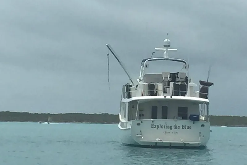 Slide: The Image of Kadey-Krogen 48 AE yacht "Exploring the Blue" anchored in calm waters, 2011 model. - 8